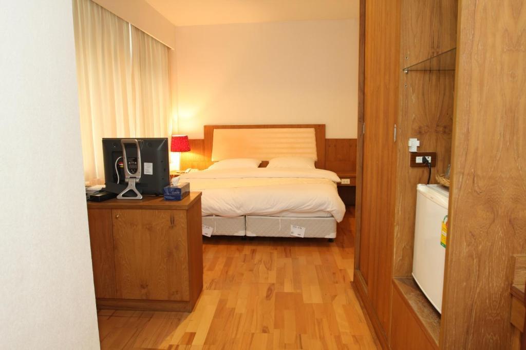 Sun City Hotel Бангкок Номер фото