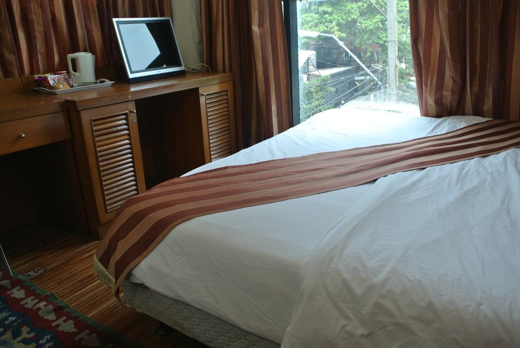 Sun City Hotel Бангкок Экстерьер фото
